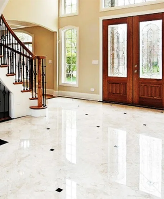 Polished stone floor in a residential entryway